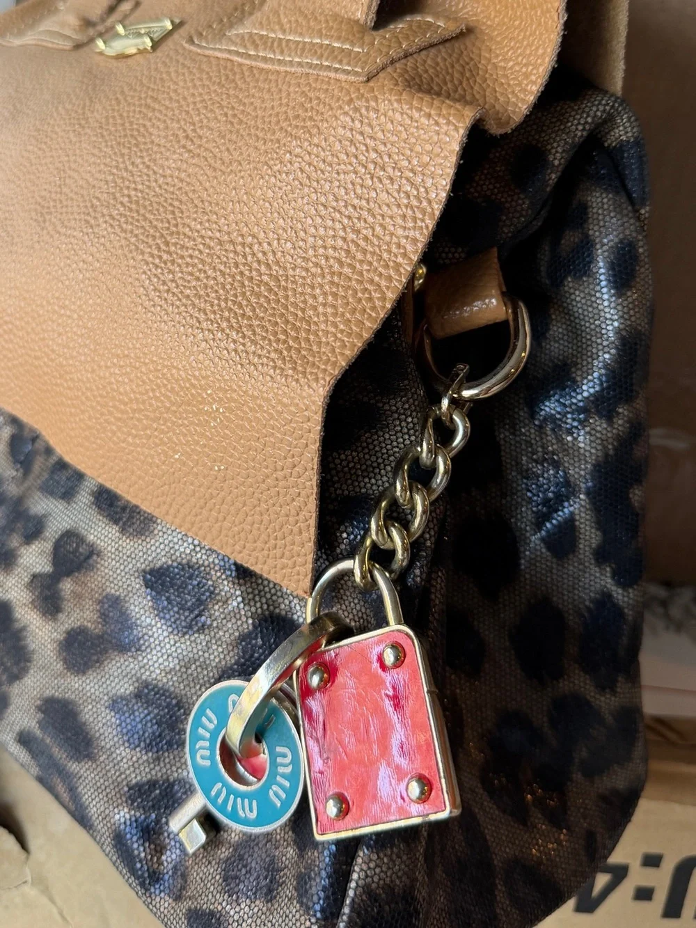 Genuine leather Leopard Print Tote with Tan Leather Trim and designer accents